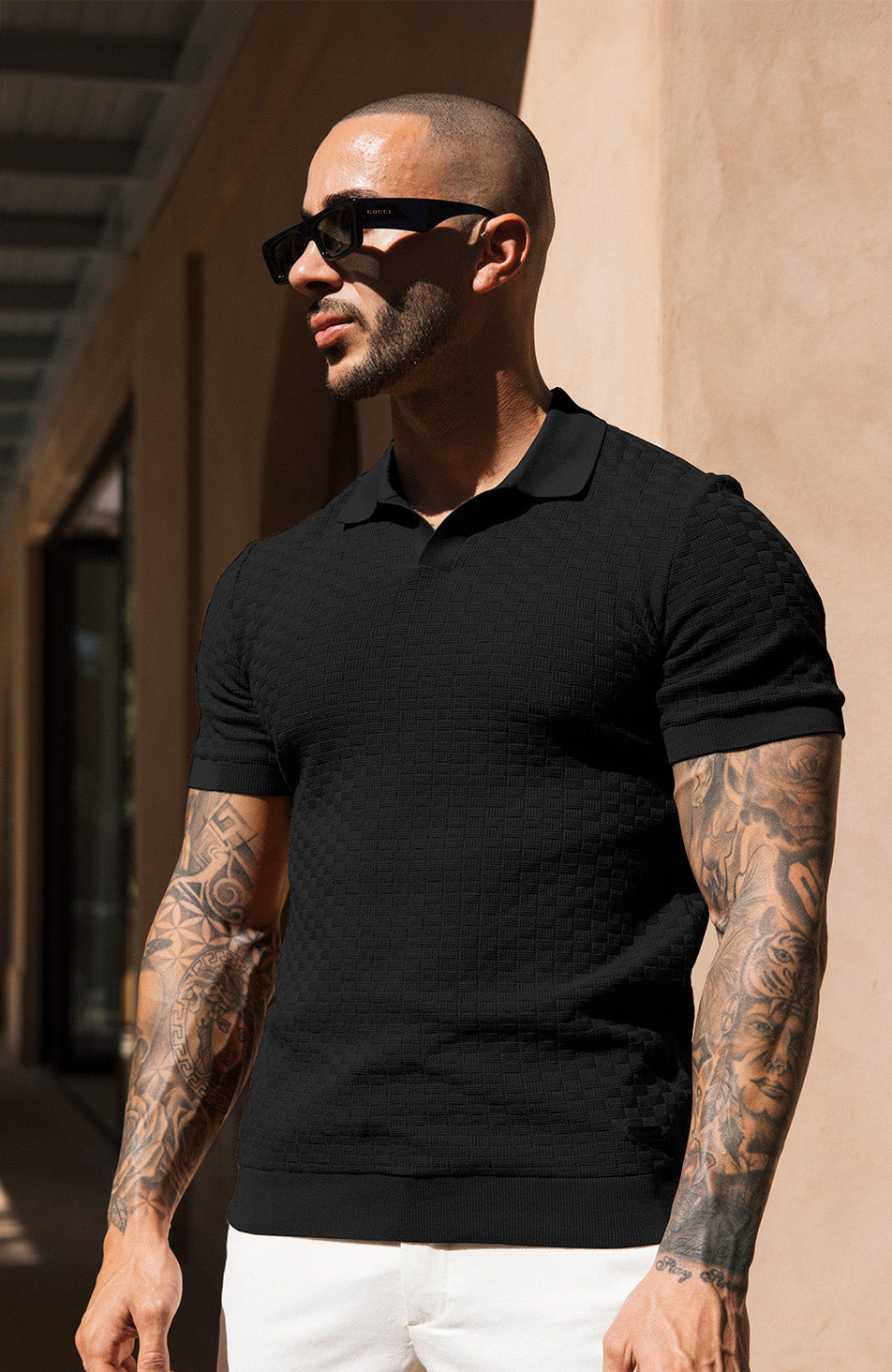 Nerano Slim Knit Polo in Black