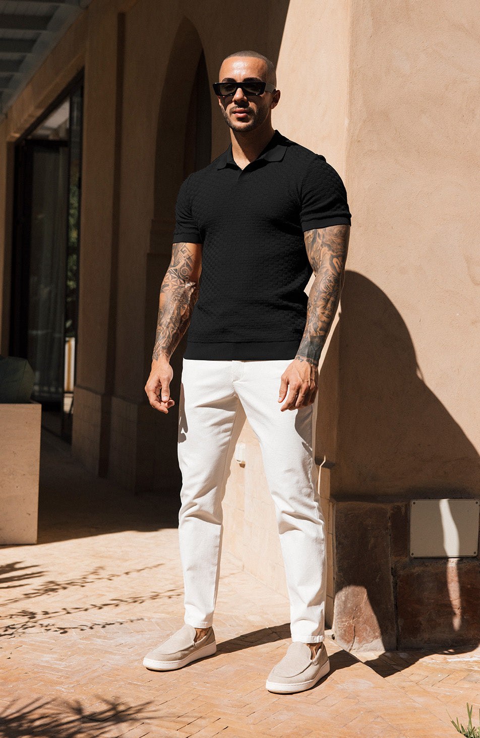 Nerano Slim Knit Polo in Black