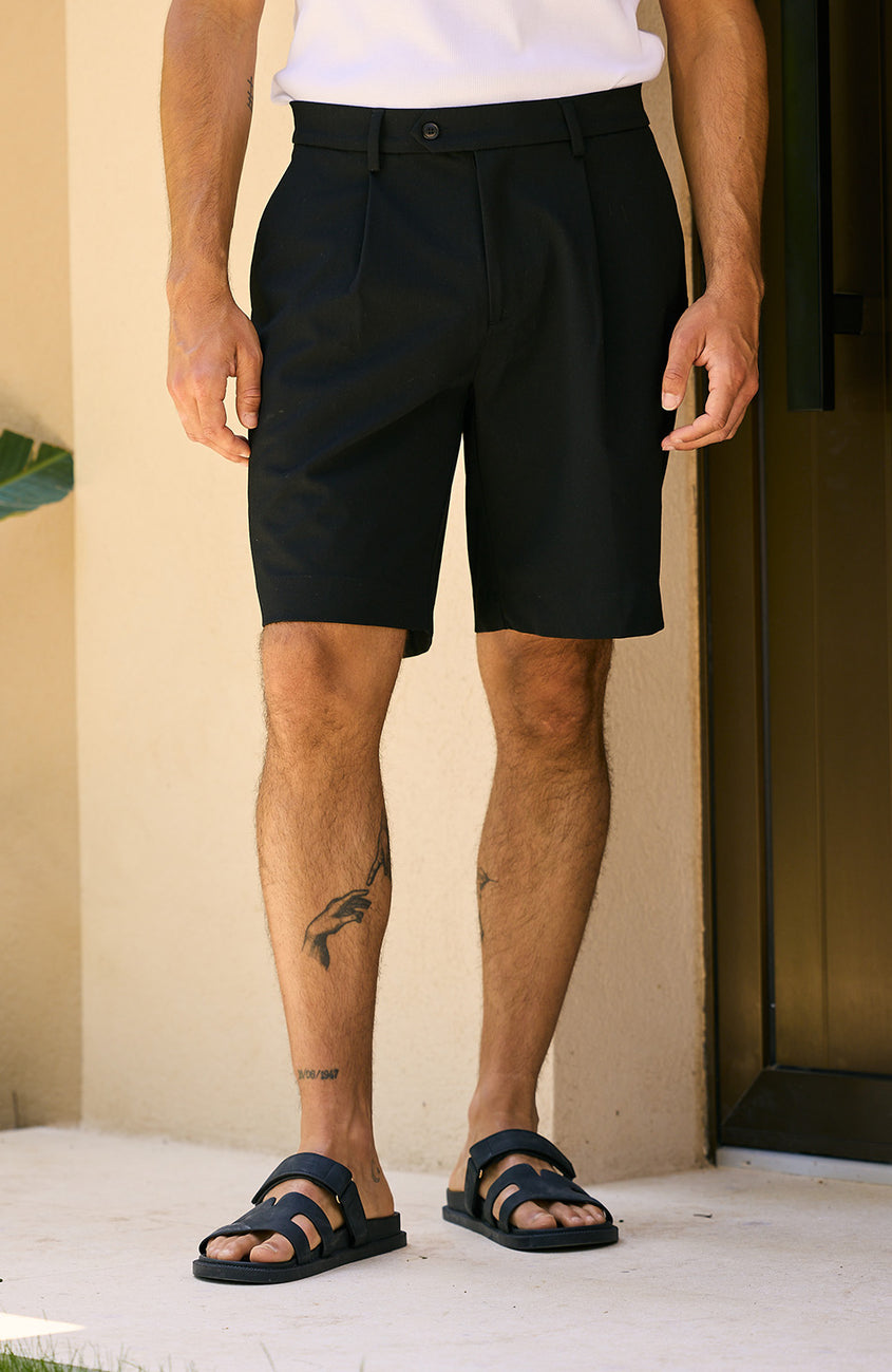 Relaxed Pleated Bermuda Shorts in Black