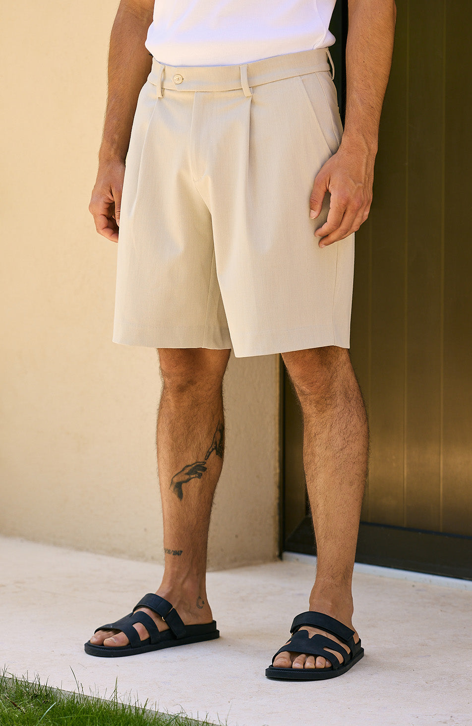 Relaxed Pleated Bermuda Shorts in Beige