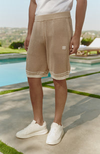 Model is 6'0 with a waist 28", wearing a W32