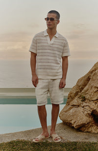 Model is 6'0, waist 32", wearing a W32