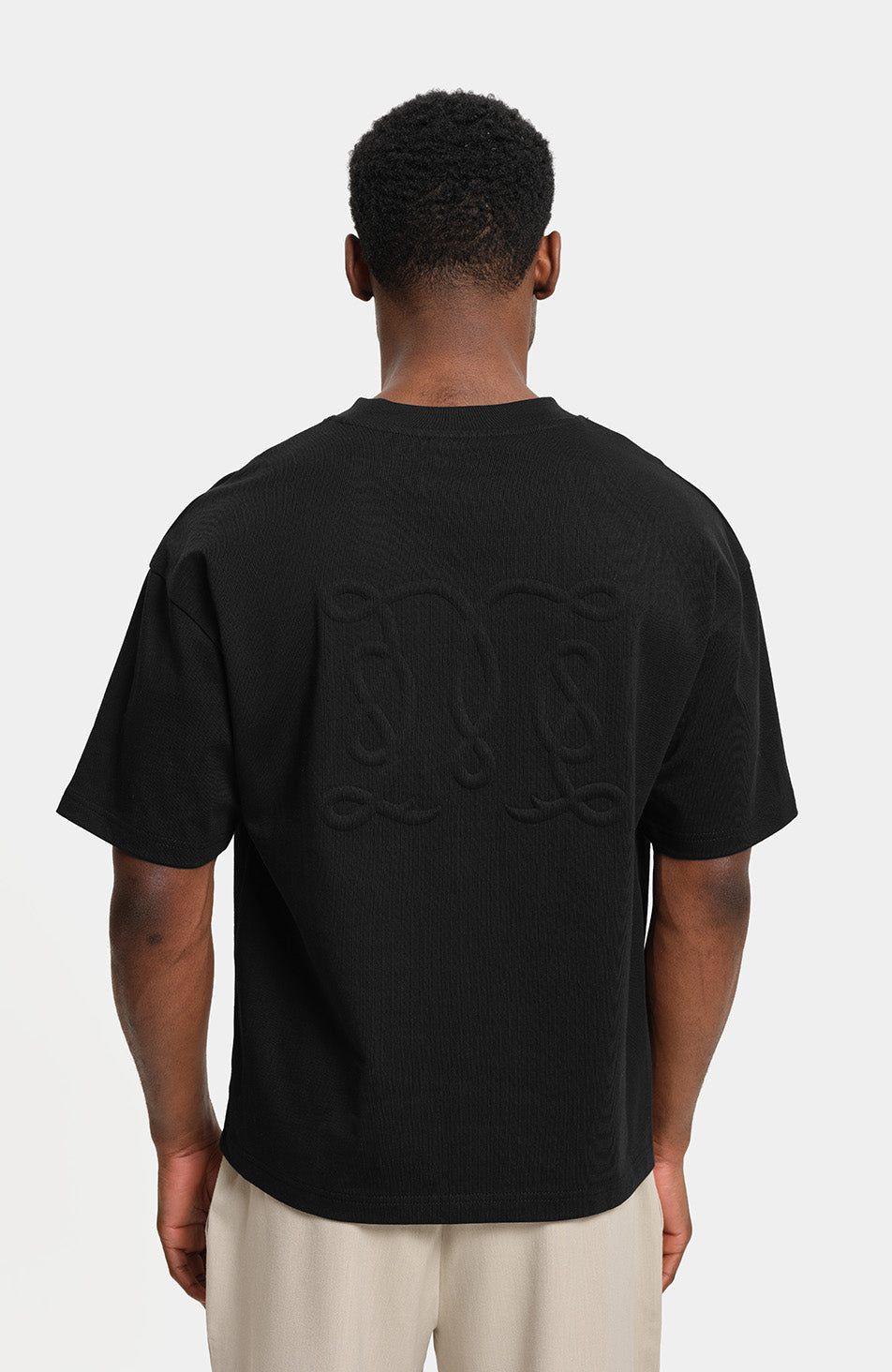 Embossed Monogram Back Logo T-shirt in Black